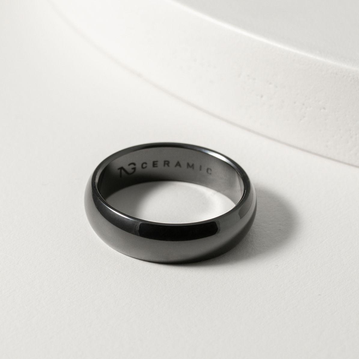 POLISHED CURVED BLACK RING